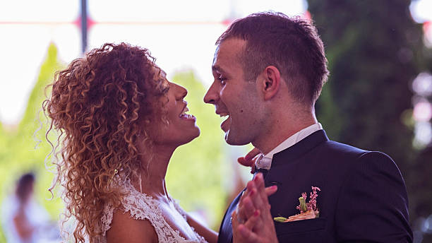 istock bride and groom dancing together their first dance. 483978652