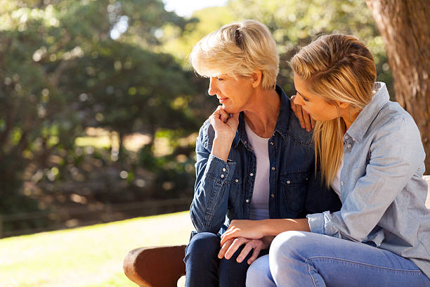istock young daughter comforting senior mother 483979606