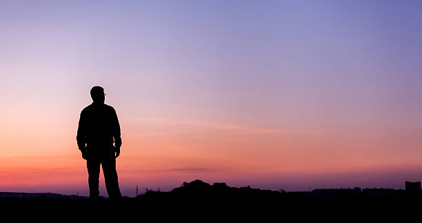 istock Silhouette of man and beautiful sky. Element of design. 483990388