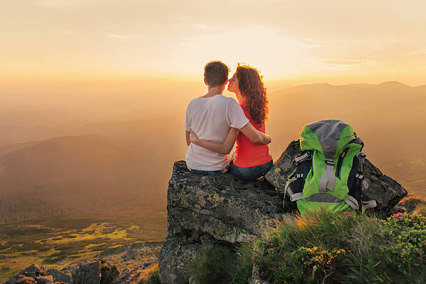 istock Happy couple enjoy beautiful view in the mountains 483990496