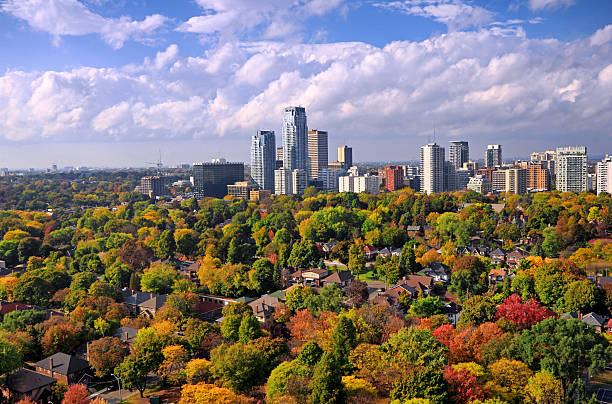 Yonge And Eglinton Area Aerial view of Toronto mid-town premier residential area including expensive single family homes and apartment condo and apartment building, from Yonge and Eglinton area, to Eglinton Avenue West and Mount Pleasant Road. Many community parks are dotting under tree canopy. This image was shot in mid-October 2013 toronto photos stock pictures, royalty-free photos & images