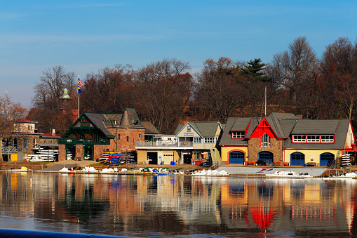 Philadelphia, USA - December 1, 2013: The Schuylkill River hosts Philadelphia’s famed boathouse row, as a colorful backdrop to the Fairmount Dam Fishway, City of Philadelphia