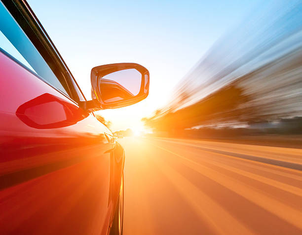 istock car on the road with motion blur background. 483992475