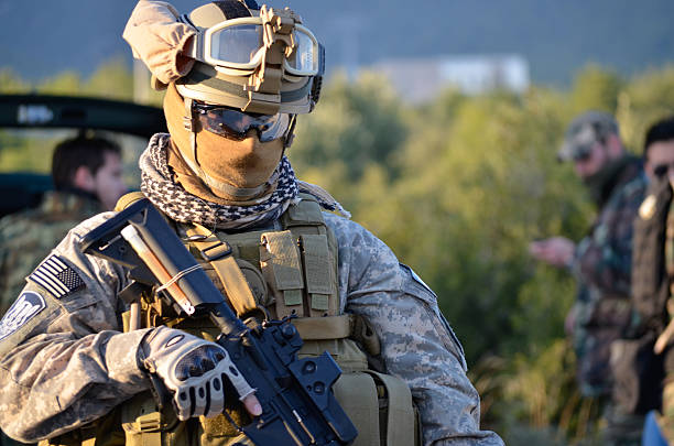 Airsoft usa uniform airsoft team before game m4 with red dot shooting guard stock pictures, royalty-free photos & images