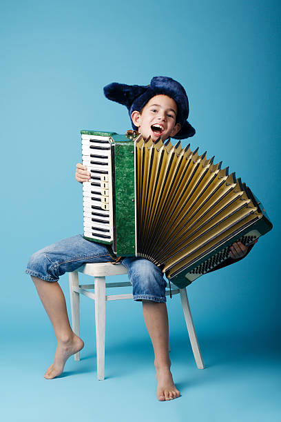 little funny accordion player on blue background