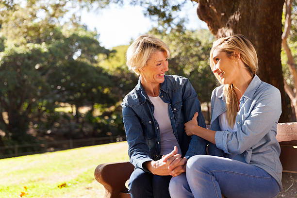 istock young girl talking to her mid age mom 483996924