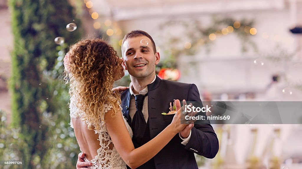 bride and groom dancing together their first dance. 2015 Stock Photo