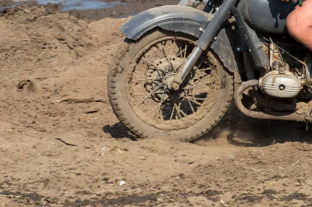rally through the mud the old military motorcycle