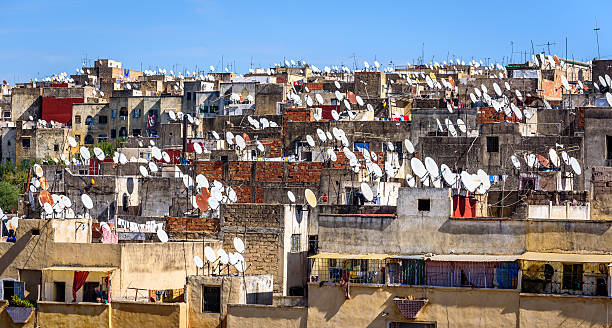 Rooftops of Fez with satellite TV dishes stock photo