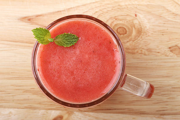 istock glass of strawberry fresh juice 483997928