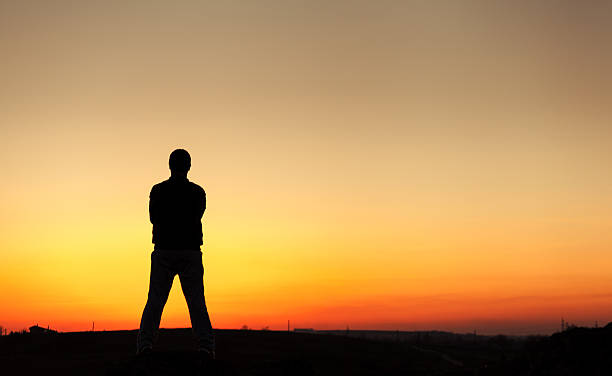 istock Silhouette of man and beautiful sky. Element of design. 483998582