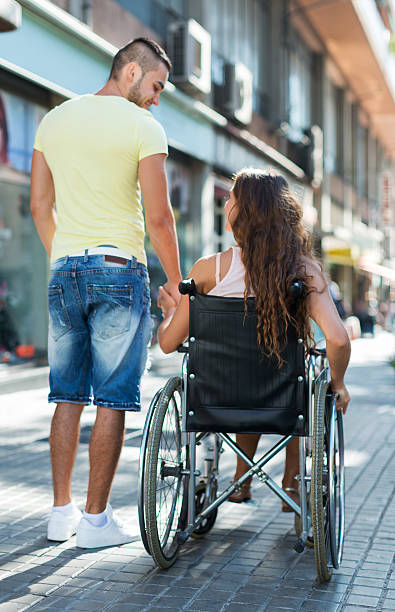istock Disabled woman in wheelchair 484000816
