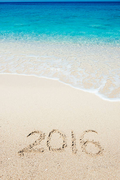 istock Summer 2016 on sandy beach - travel and holiday concept 484003906