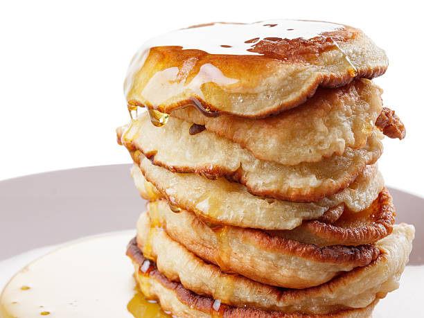 istock Stack of pancakes, syrup isolated on white background 484004408