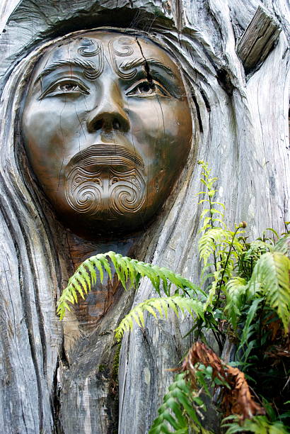 'Papa and Rangi' Sculpture by Brian Woodward and Ken Blum Nelson, New Zealand - March 05, 2012. Close-Up of Iconic Papa & Rangi Sculpture at Arts Unique, next to the enterance to the Abel Tasman National Park, Marahau, Tasman Region, New Zealand. woodward stock pictures, royalty-free photos & images