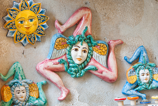 Close up view of some typical sicilian ceramic souvenirs in a street of Castelmola