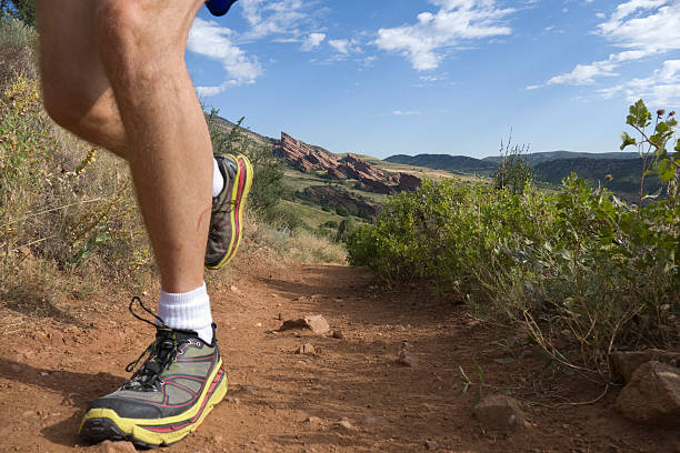 istock Man trail runs Mount Falcon past Red Rocks Colorado mountains 484013996