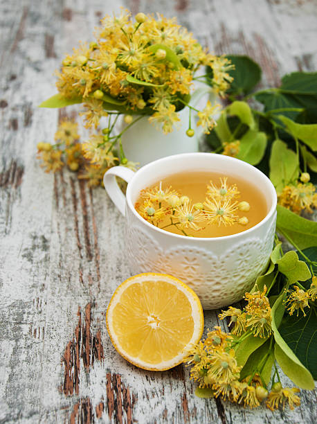 istock Cup of herbal tea with linden flowers 484014262