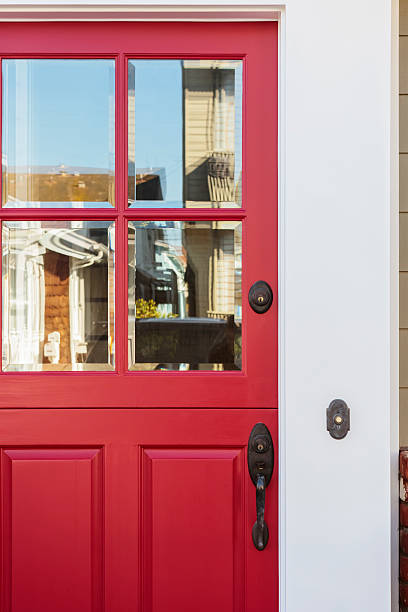 istock Crop of red front door with reflection 484014517