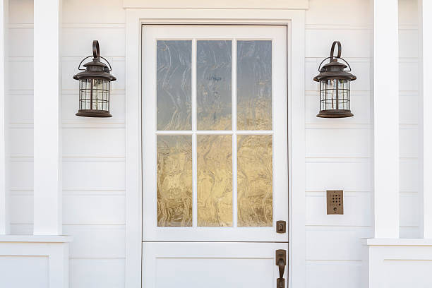 Cropped detail of white door to classic home stock photo