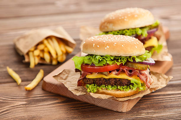 istock Delicious hamburger and fries 484014670