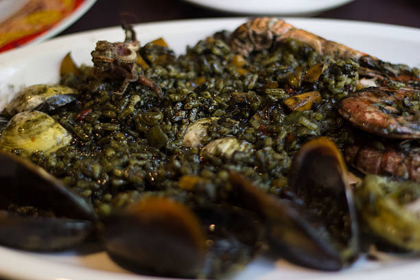 istock black rice paella Barcelona Spain 484014694