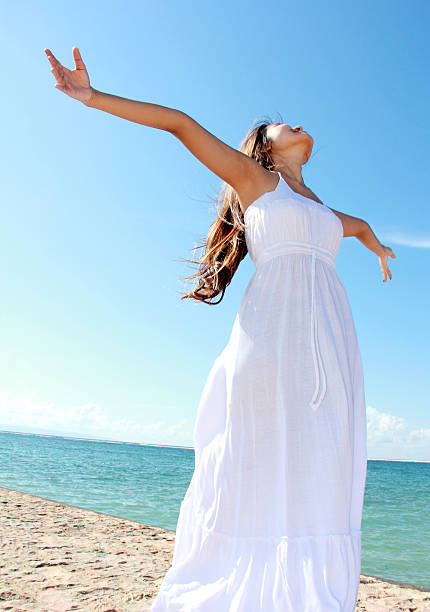 istock Woman with arms open enjoying her freedom 484014967
