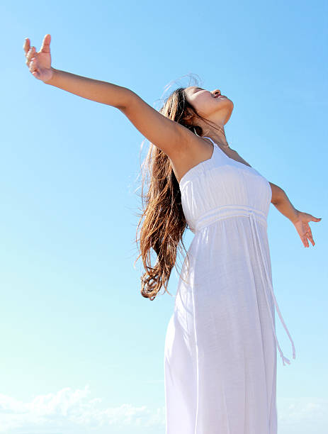 istock Woman with arms open enjoying her freedom 484014971