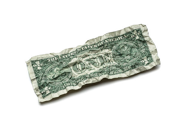 istock Crumpled dollar bills isolated on white background 484016565