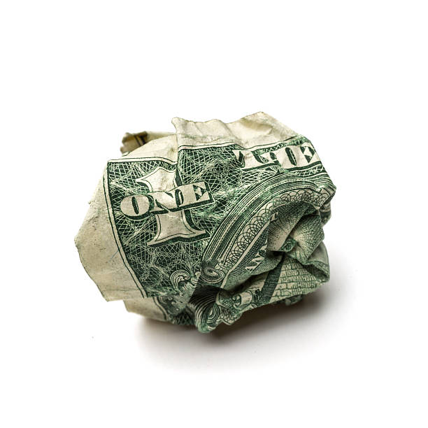 istock Crumpled dollar bills isolated on white background 484016567
