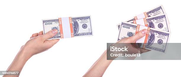 Big Packs Of Dollars In Hand Isolated Stock Photo - Download Image Now - Achievement, Aspirations, Banking
