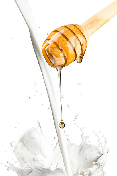 Milk Splash With Honey stock photo