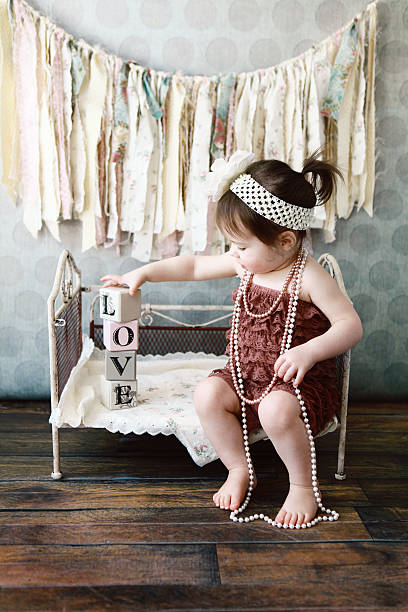 istock Little Girl Playing with Blocks 484018253