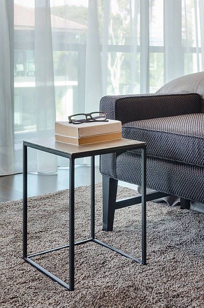 istock glass and books on modern style table 484021084