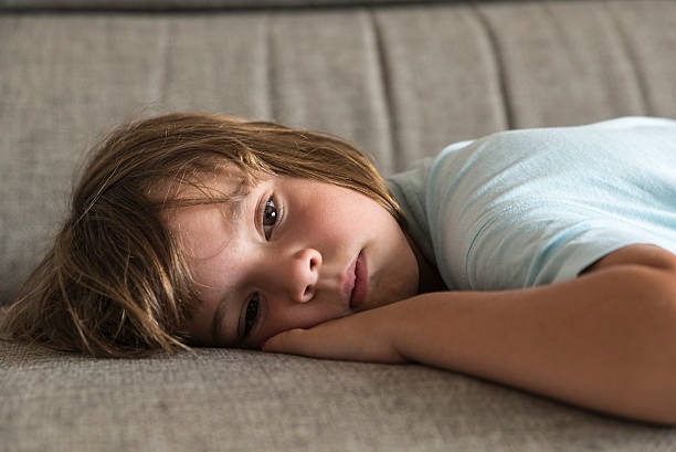 istock Little girl watching TV 484021164