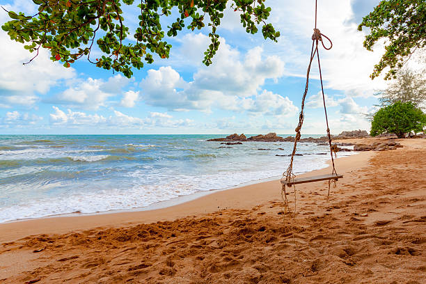 istock Swing on the beach and cloud at Chanthaburi, Thailand. 484022516