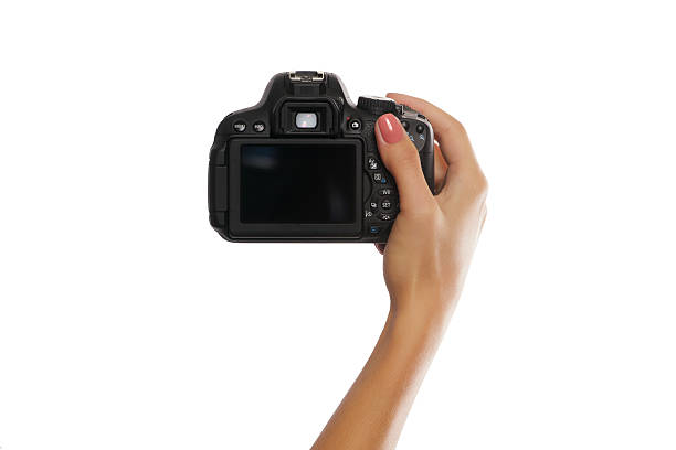 istock Female hand with digital camera isolated on white 484022530