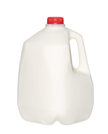 gallon Milk Bottle with Red Cap Isolated on White Background.