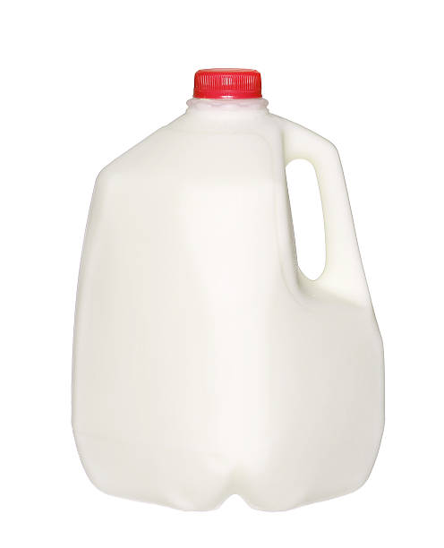 galão garrafa de leite com tampa vermelha isolada no branco - galão - fotografias e filmes do acervo