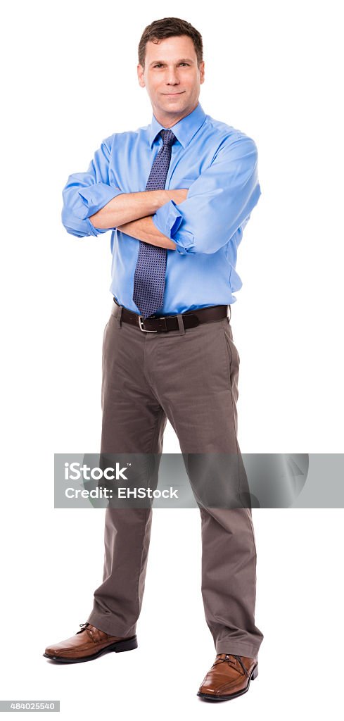 Casual Businessman with Arms Crossed on White Business casual businessman, thirties, with arms crossed, sleeves rolled up,  isolated on white background Business Stock Photo