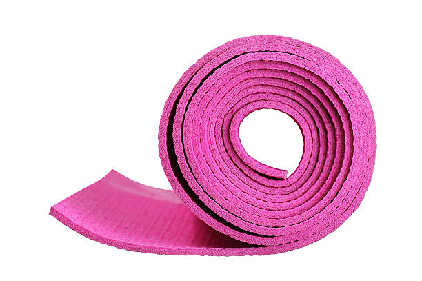 istock Pink Yoga Mat Isolated on white 484025980