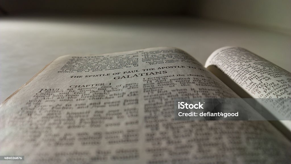 Galatians The title page of Galatians, in a tattered, old copy of the Holy Bible. 2015 Stock Photo
