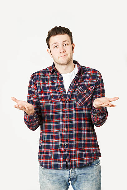 istock Studio Portrait Of Man Shrugging Shoulders 484028950