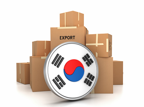 Boxes with trade merchandise with South Korean flag button. Clipping path included.  (Please note that clipping path will be available in the largest file size purchase.)