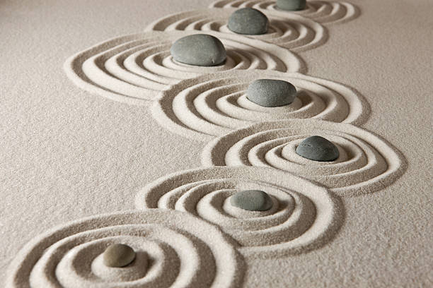 Zen stones Stones on raked sand japanese rock garden stock pictures, royalty-free photos & images