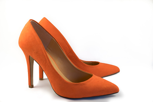 A Pair of Orange High Heel Shoes on White Background