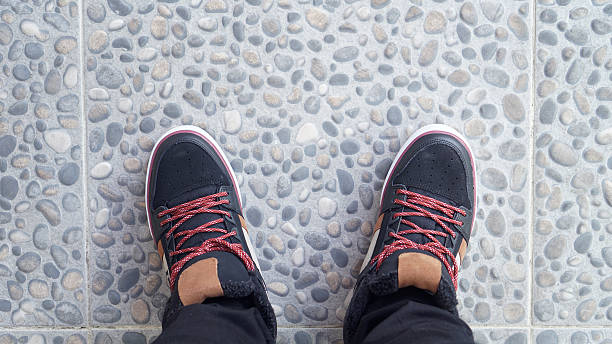 istock boy with his brand new sneakers going out 484032826