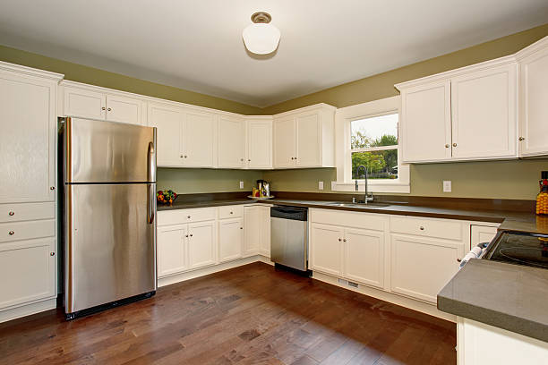 istock Classic kitchen with green interior paint, and white cabinets. 484033184
