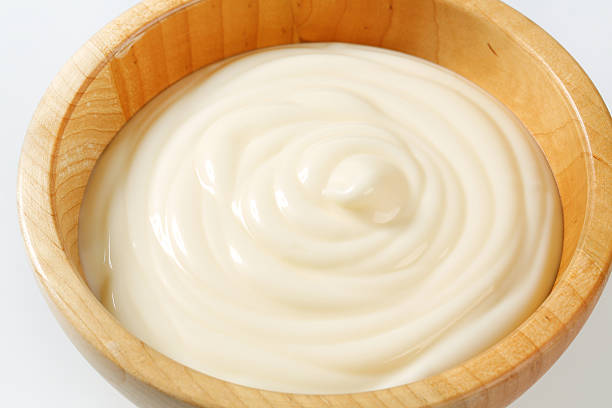 istock Creamy sauce in wooden bowl 484033468