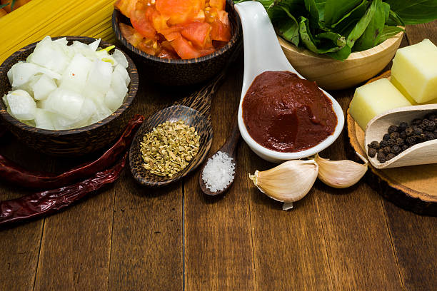 istock Raw spaghetti Ingredients on wooden table 484035054